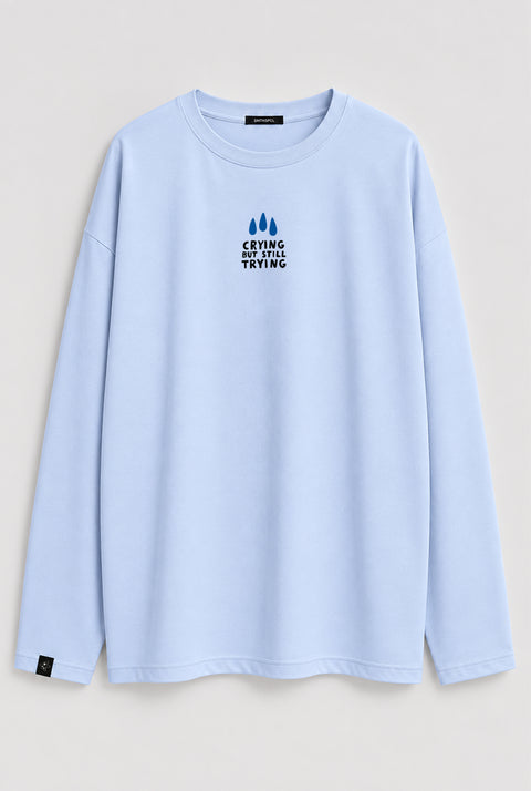 Oversized Long-Sleeve Shirt "Crying but still trying"