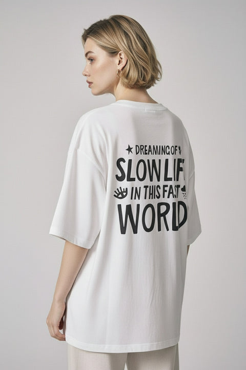 Футболка оверсайз унисекс "Dreaming of slow life in this fast world"