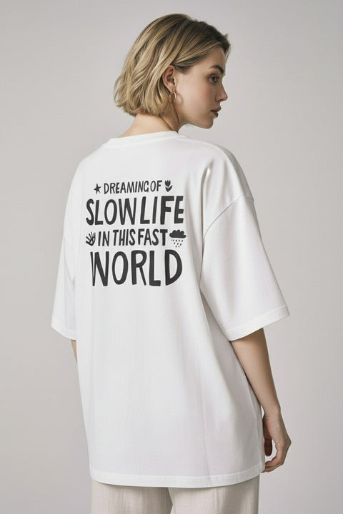 Футболка оверсайз унисекс "Dreaming of slow life in this fast world"
