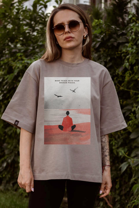 Oversized T-shirt "Make peace with your broken pieces"