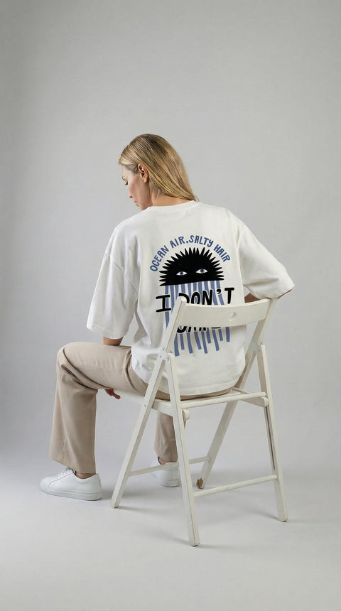 Oversize'owa koszulka "I don't care"