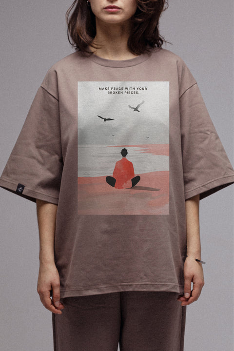 Oversized T-shirt "Make peace with your broken pieces"