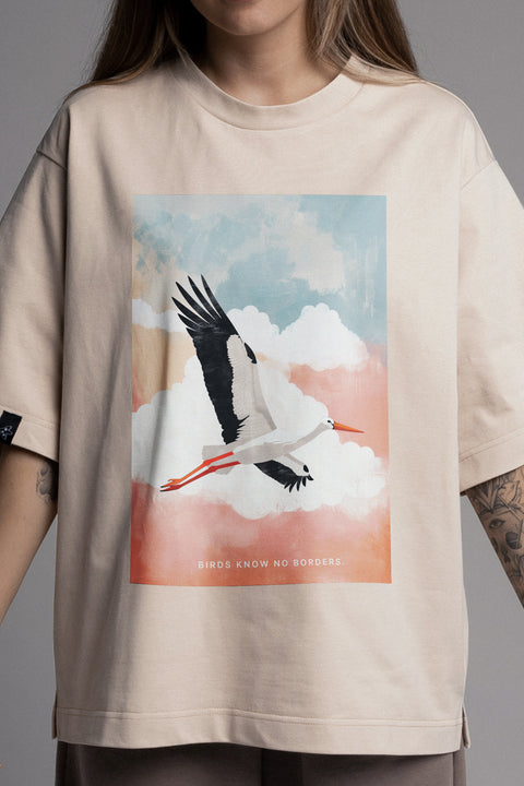 Oversized T-shirt "Birds know no borders"